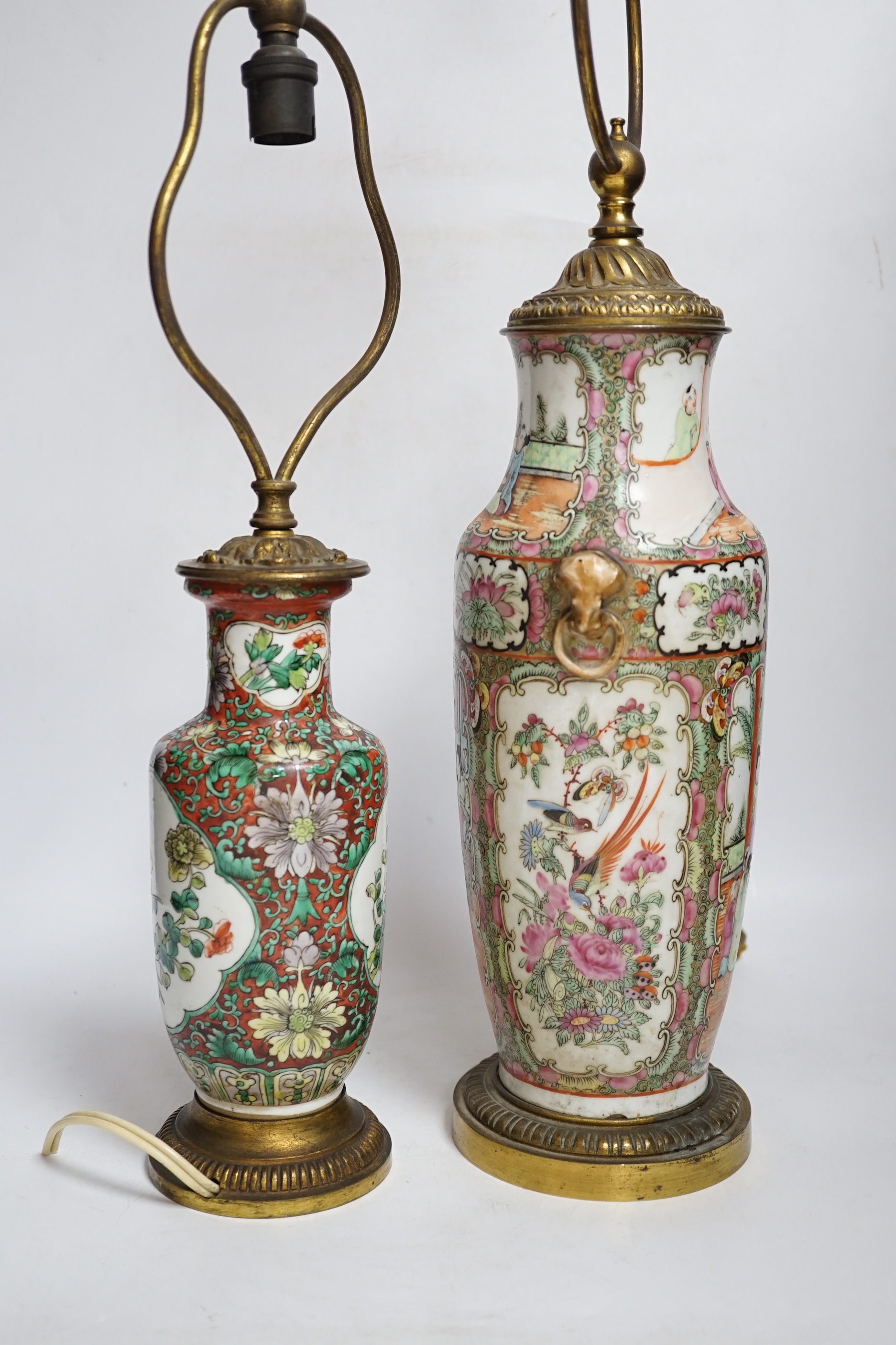 A late 19th century Chinese famille rose vase and another, both mounted and converted to lamps, tallest 62cm